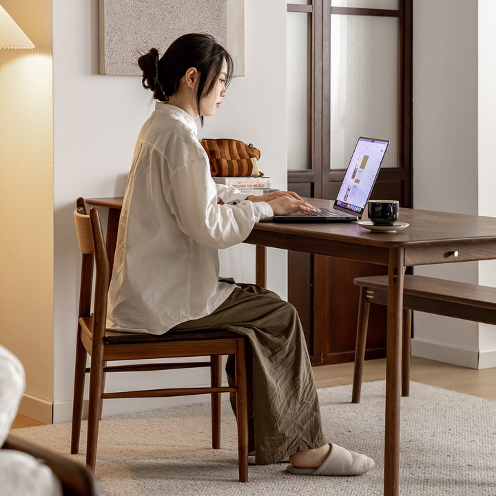 Vintage walnut wood dining chair chrono in details.