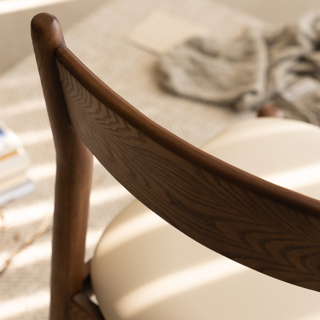 Vintage walnut wood dining chair purea in still life.