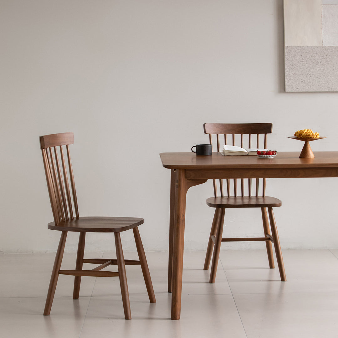 Vintage walnut wood dining chair windsor with context.