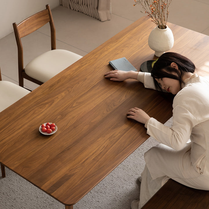 Vintage walnut wood dining table chrono with context.