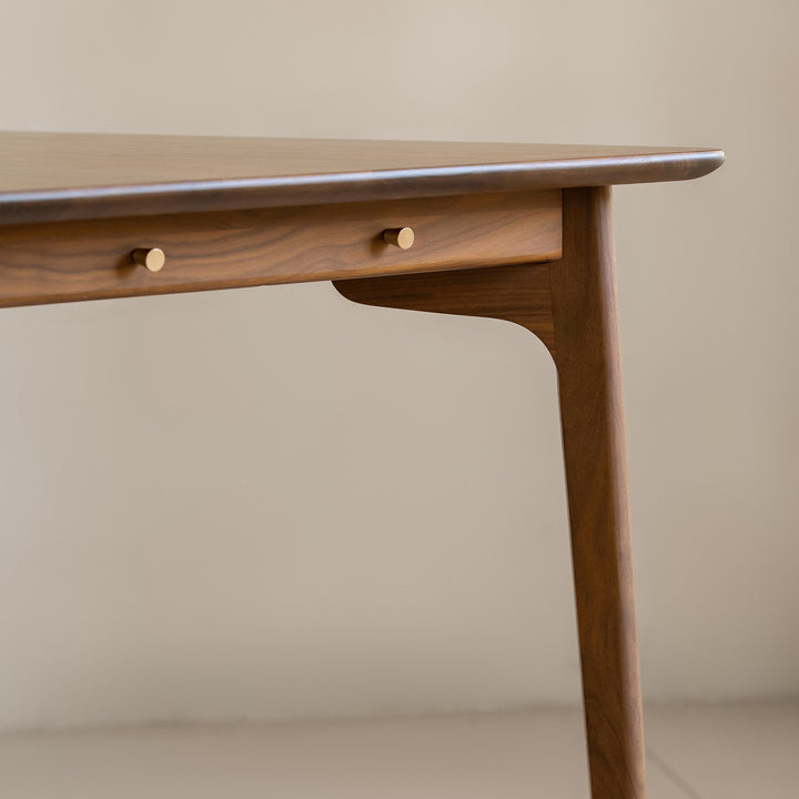 Vintage walnut wood dining table chrono in close up details.