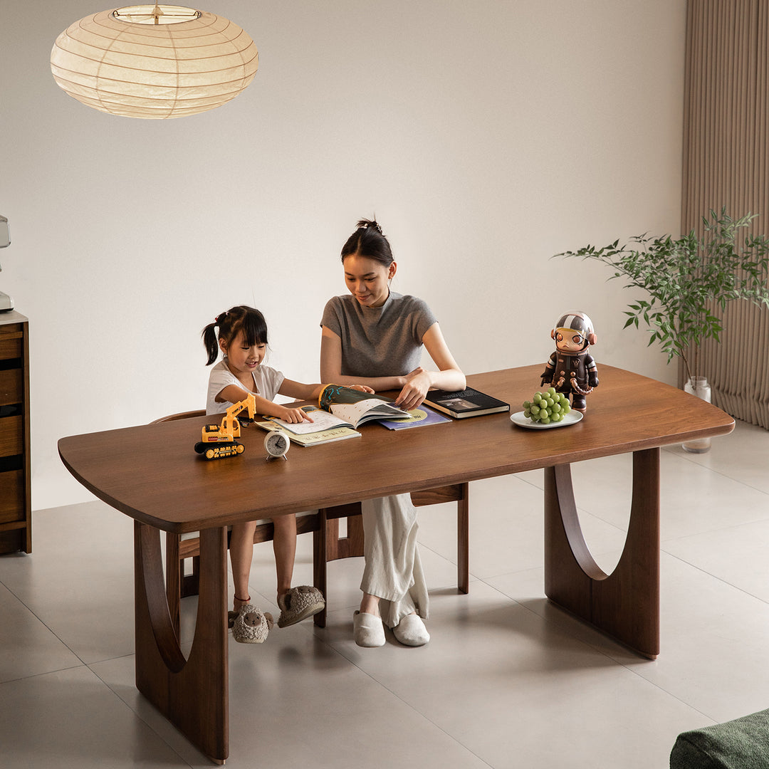 Vintage walnut wood dining table rockwel in real life style.