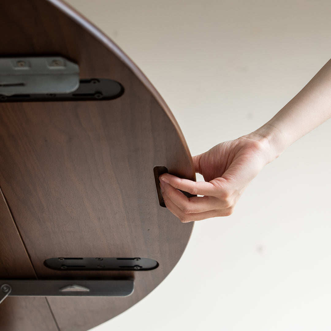 Vintage walnut wood extendable dining table minima in details.