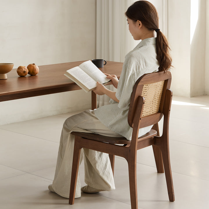 Vintage walnut wood rattan dining chair nook primary product view.