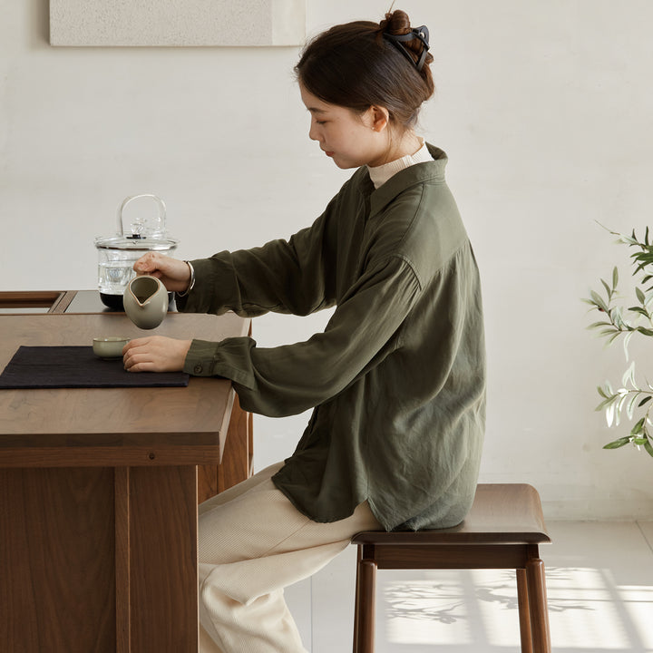 Vintage walnut wood stool arcus in panoramic view.