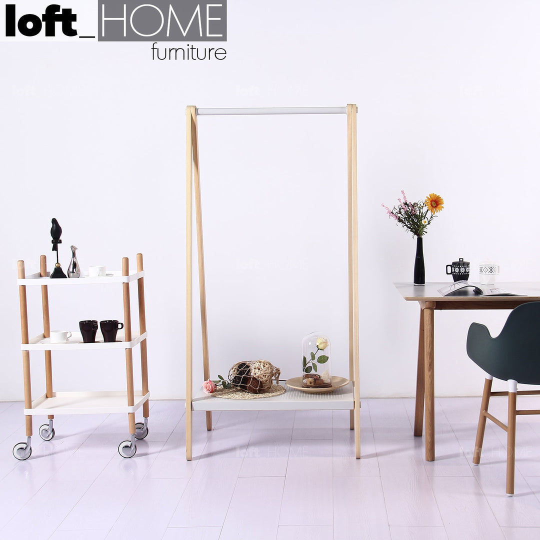 Scandinavian wood cloth hanger shelf toj in real life style.